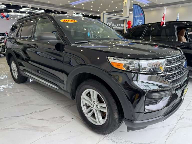 Ideal Auto Bensonhurst showroom displaying a pre owned car in Brooklyn.