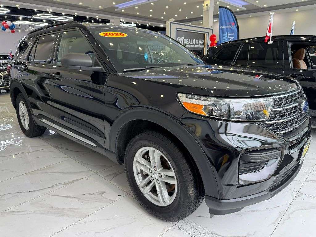 Ideal Auto Bensonhurst showroom displaying a pre owned car in Brooklyn.
