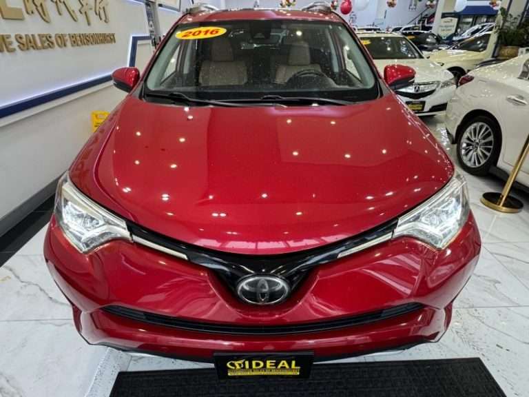 2016 Toyota RAV4 front view on showroom floor at iDeal Automotive Sales of Bensonhurst
