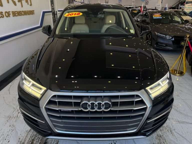 2018 Audi Q5 Premium Plus displayed indoors at iDeal Auto Sales of Bensonhurst in Brooklyn